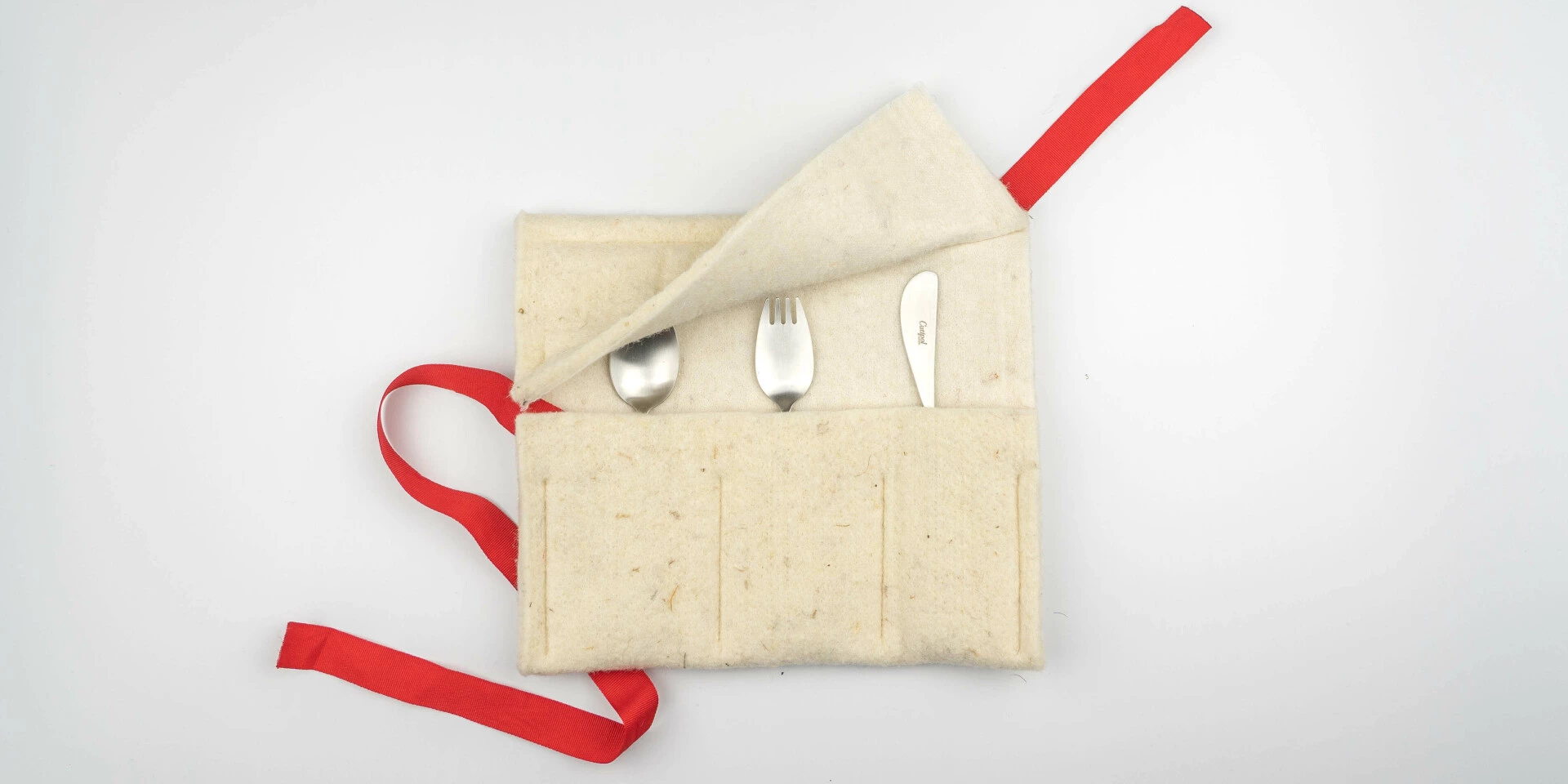 Alice cutlery for children by Cutipol with open wool case.